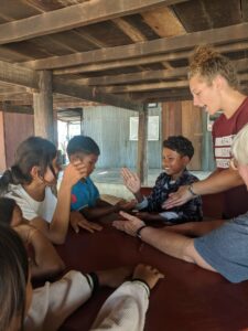 This is me teaching the kids a hand game 