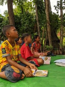 The kids listening so intently, I love it. They're so eager to learn, they soak up everything they can.